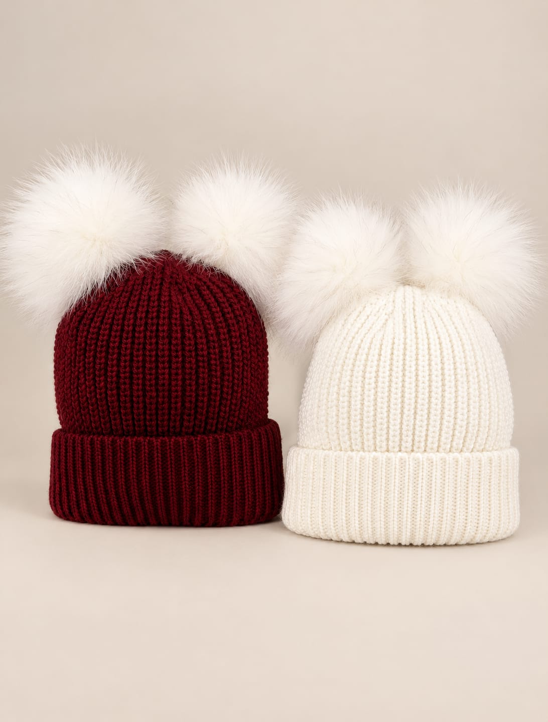 Cappello con doppio pon pon