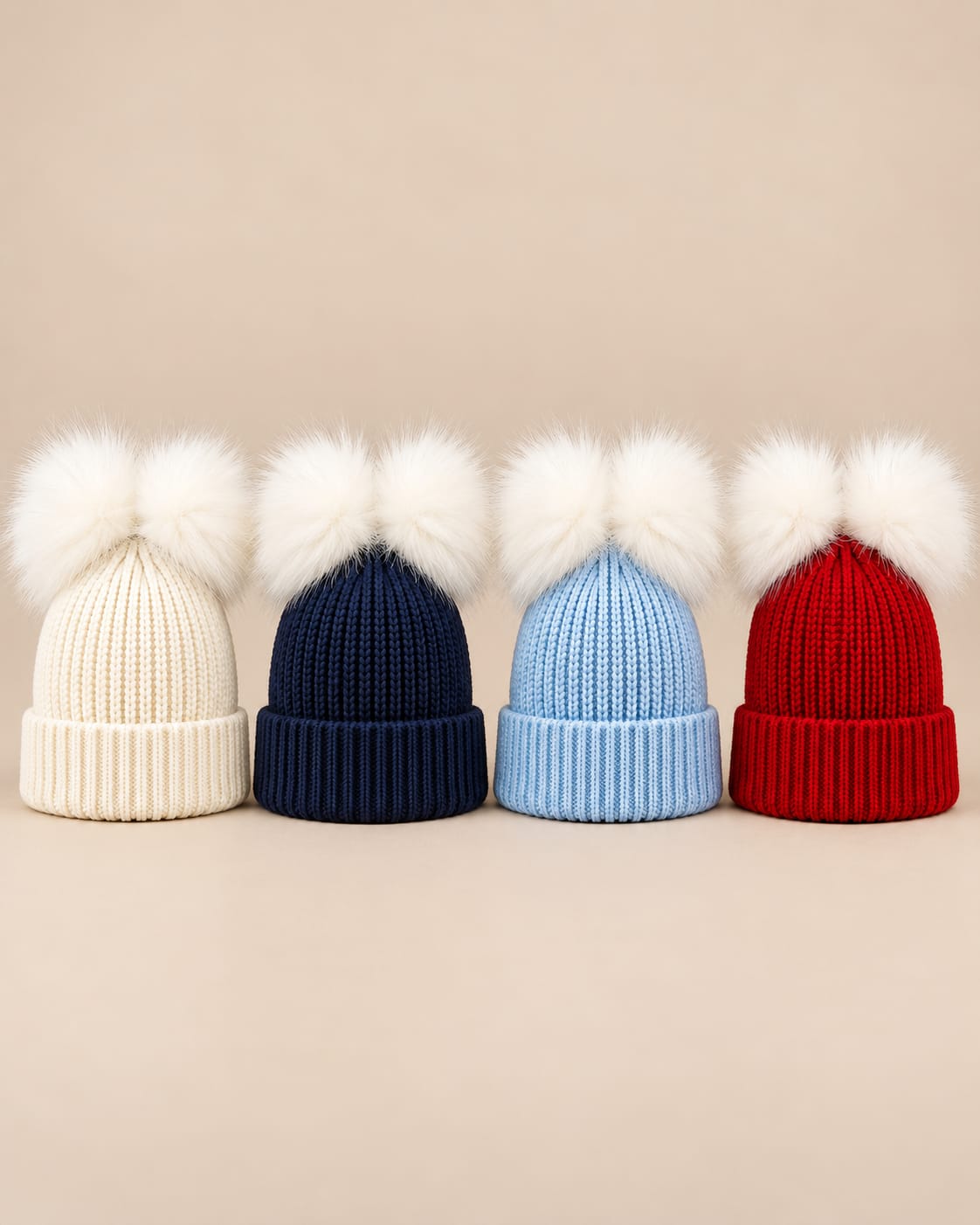 Cappello con doppio pon pon